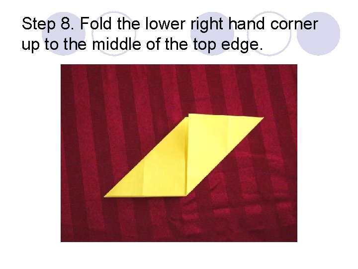 Step 8. Fold the lower right hand corner up to the middle of the