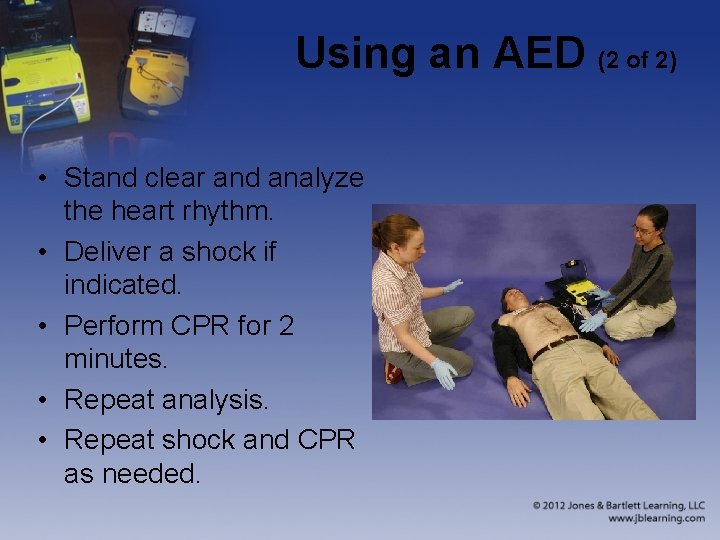 Using an AED (2 of 2) • Stand clear and analyze the heart rhythm.
