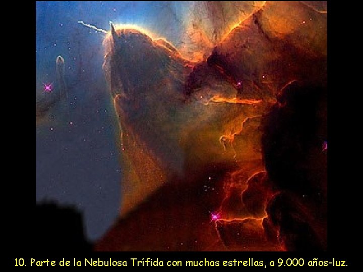 10. Parte de la Nebulosa Trífida con muchas estrellas, a 9. 000 años-luz. 