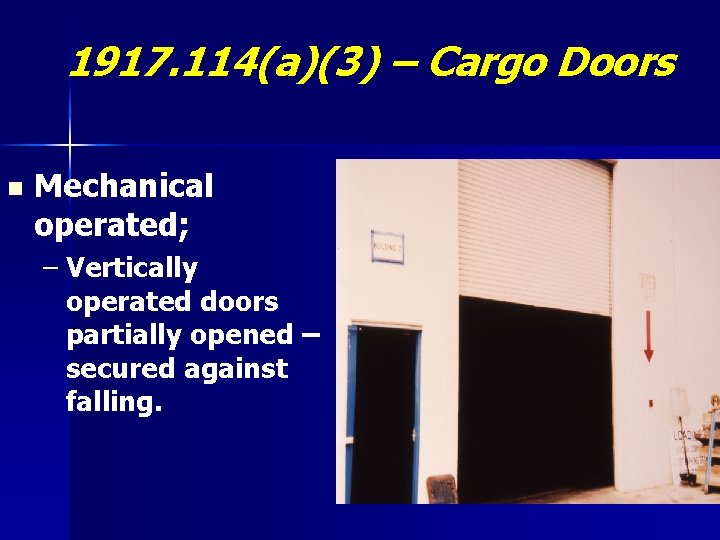 1917. 114(a)(3) – Cargo Doors n Mechanical operated; – Vertically operated doors partially opened