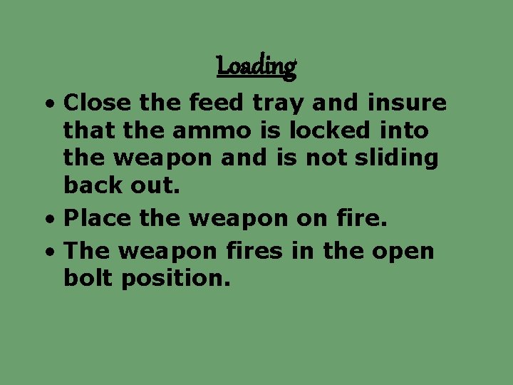 Loading • Close the feed tray and insure that the ammo is locked into