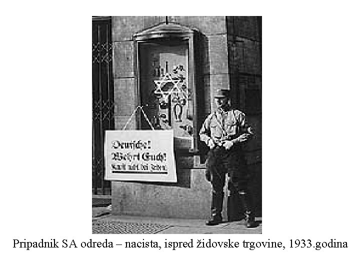 Pripadnik SA odreda – nacista, ispred židovske trgovine, 1933. godina 