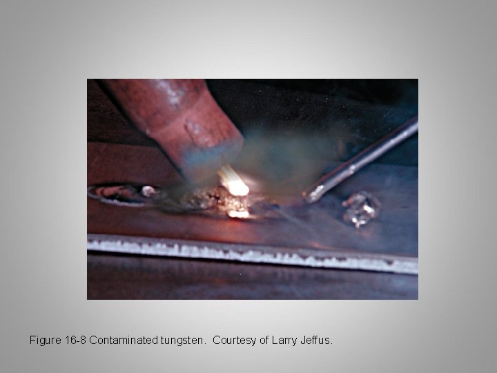 Figure 16 -8 Contaminated tungsten. Courtesy of Larry Jeffus. 