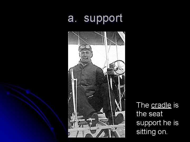 a. support The cradle is the seat support he is sitting on. 