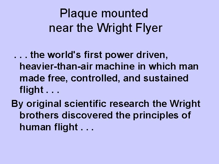 Plaque mounted near the Wright Flyer. . . the world's first power driven, heavier-than-air