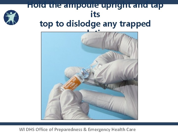 Hold the ampoule upright and tap its top to dislodge any trapped solution. WI