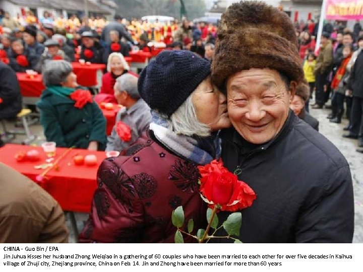 CHINA - Guo Bin / EPA Jin Juhua kisses her husband Zhong Weiqiao in