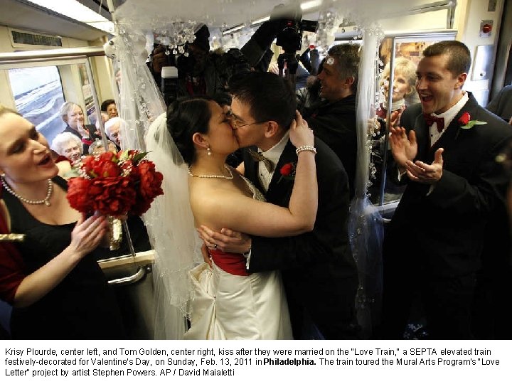 Krisy Plourde, center left, and Tom Golden, center right, kiss after they were married