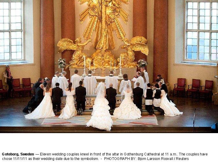 Goteborg, Sweden — Eleven wedding couples kneel in front of the altar in Gothenburg