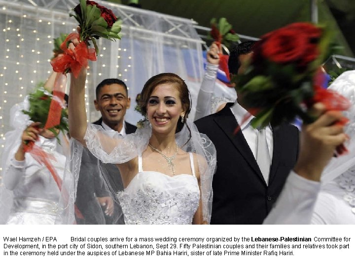 Wael Hamzeh / EPA Bridal couples arrive for a mass wedding ceremony organized by