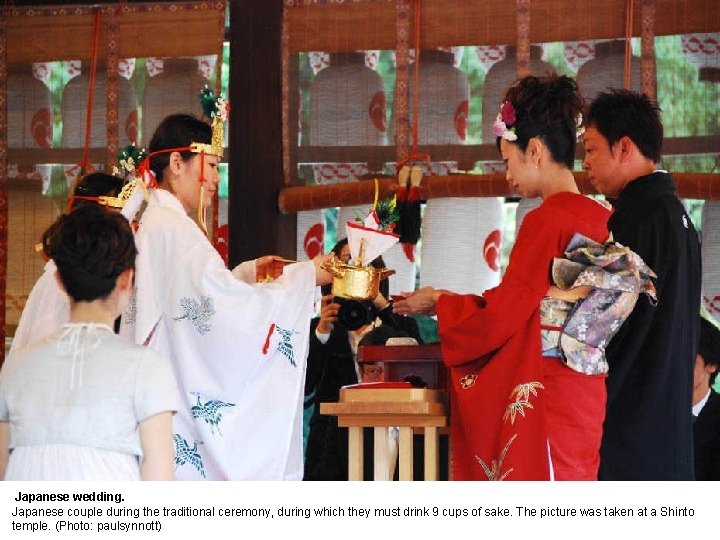 Japanese wedding. Japanese couple during the traditional ceremony, during which they must drink 9