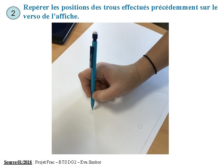 2 Repérer les positions des trous effectués précédemment sur le verso de l’affiche. Source