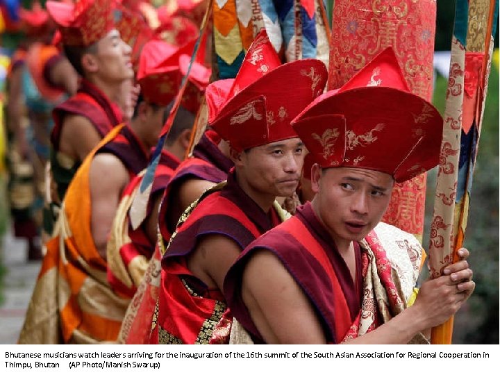 Bhutanese musicians watch leaders arriving for the inauguration of the 16 th summit of