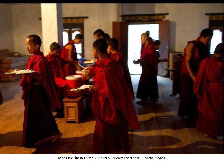 Monastic Life In Thimphu Bhutan - Monks eat dinner Getty images 