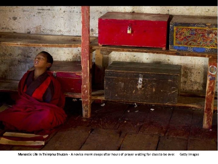 Monastic Life In Thimphu Bhutan - A novice monk sleeps after hours of prayer