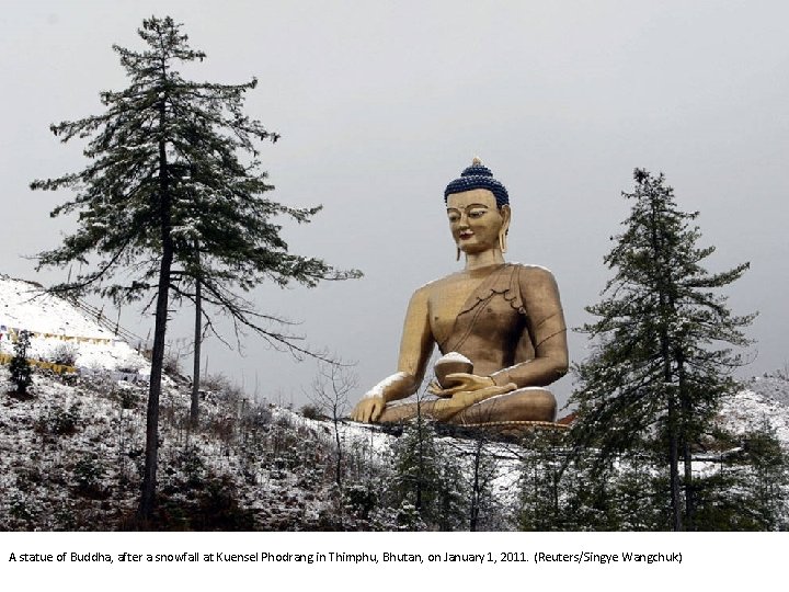 A statue of Buddha, after a snowfall at Kuensel Phodrang in Thimphu, Bhutan, on