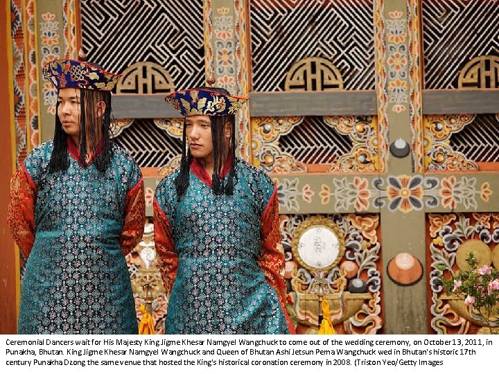 Ceremonial Dancers wait for His Majesty King Jigme Khesar Namgyel Wangchuck to come out