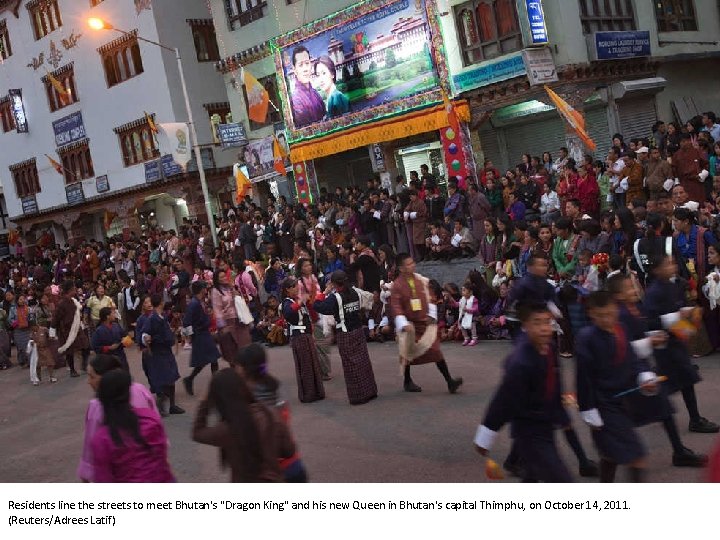 Residents line the streets to meet Bhutan's "Dragon King" and his new Queen in