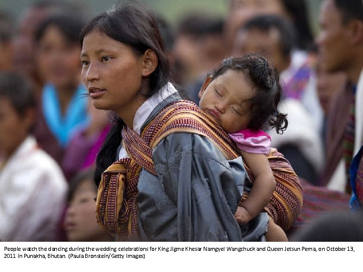 People watch the dancing during the wedding celebrations for King Jigme Khesar Namgyel Wangchuck