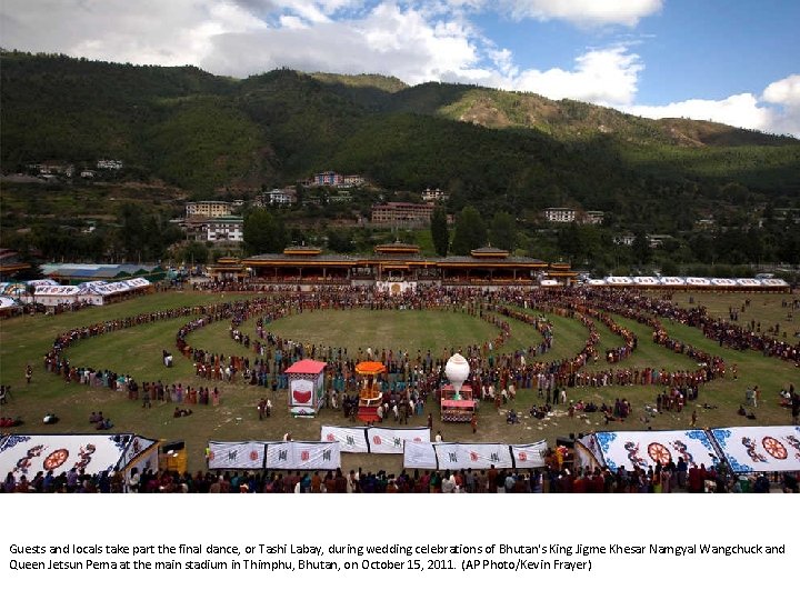 Guests and locals take part the final dance, or Tashi Labay, during wedding celebrations