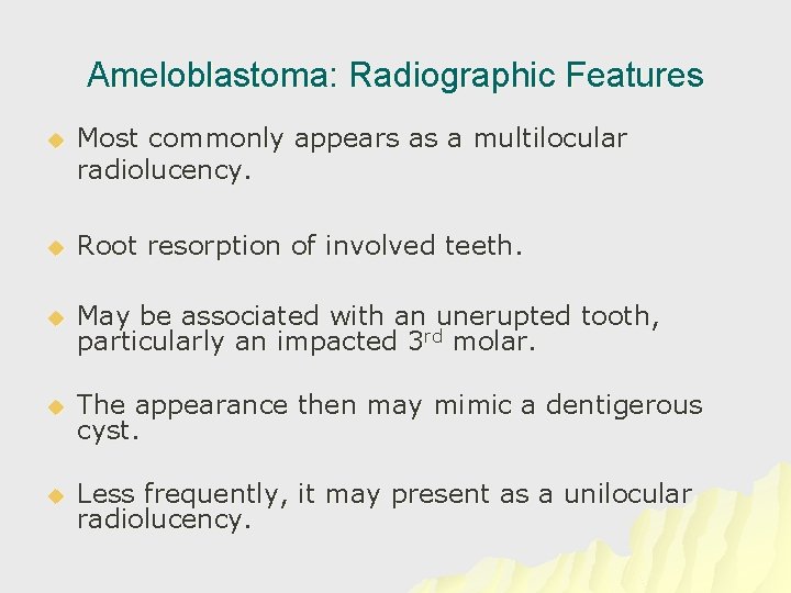 Ameloblastoma: Radiographic Features u Most commonly appears as a multilocular radiolucency. u Root resorption