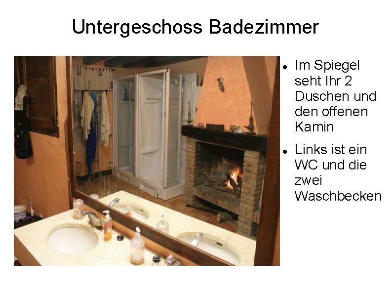 Untergeschoss Badezimmer Im Spiegel seht Ihr 2 Duschen und den offenen Kamin Links ist