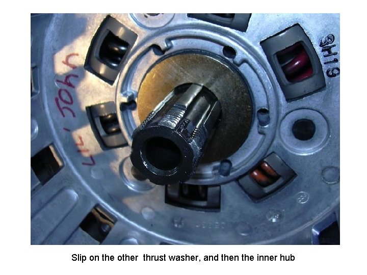 Slip on the other thrust washer, and then the inner hub 