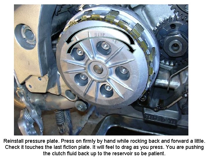 Reinstall pressure plate. Press on firmly by hand while rocking back and forward a
