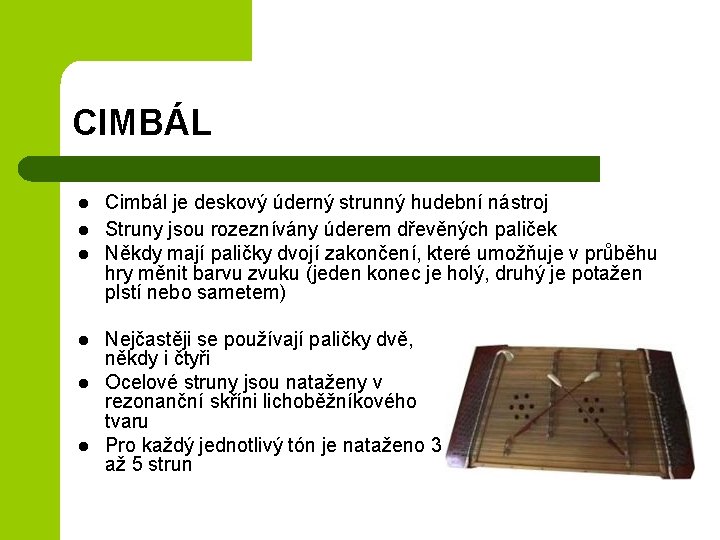 CIMBÁL l l l Cimbál je deskový úderný strunný hudební nástroj Struny jsou rozeznívány