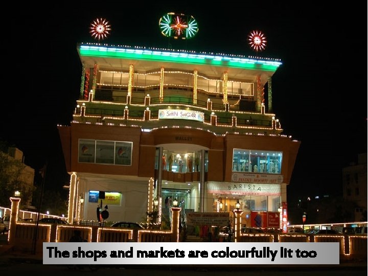 The shops and markets are colourfully lit too 