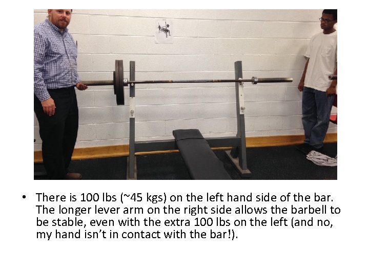  • There is 100 lbs (~45 kgs) on the left hand side of