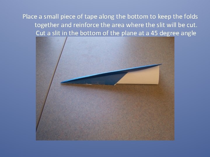 Place a small piece of tape along the bottom to keep the folds together