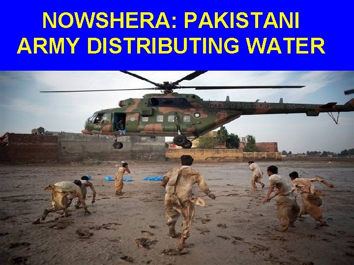 NOWSHERA: PAKISTANI ARMY DISTRIBUTING WATER 