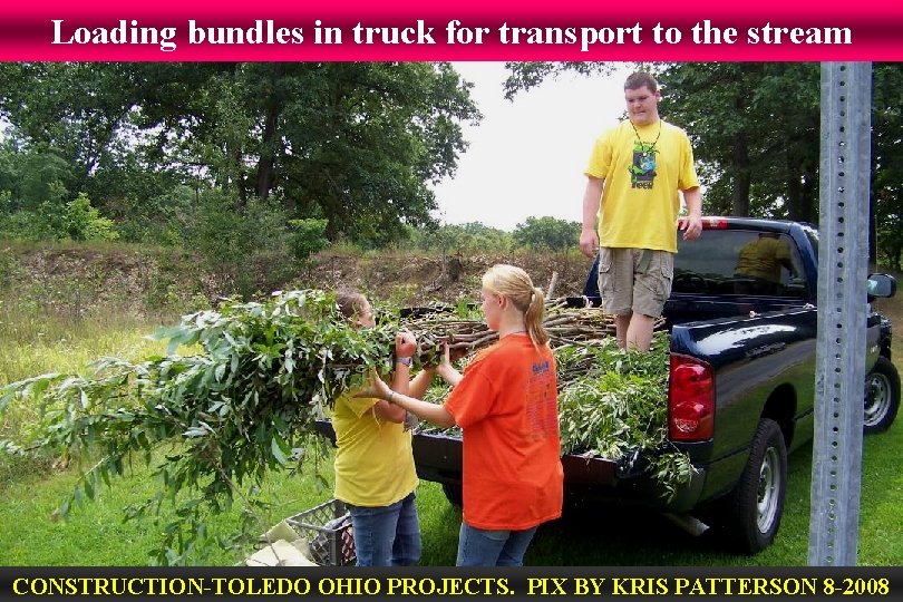 Loading bundles in truck for transport to the stream CONSTRUCTION-TOLEDO OHIO PROJECTS. PIX BY