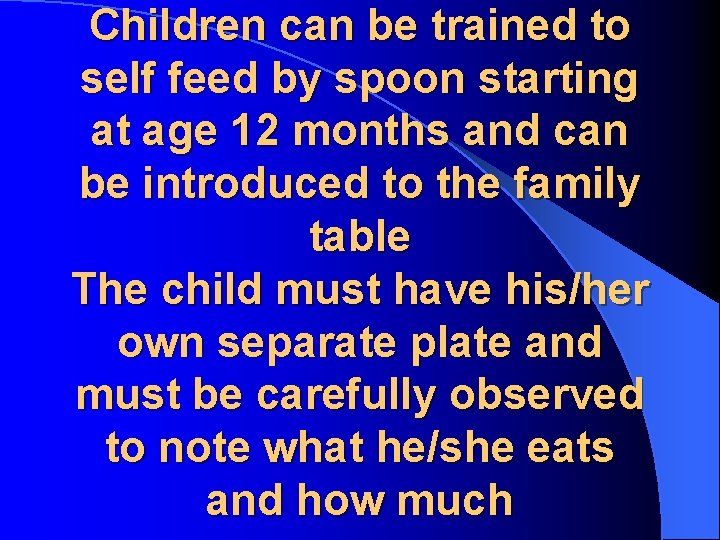 Children can be trained to self feed by spoon starting at age 12 months