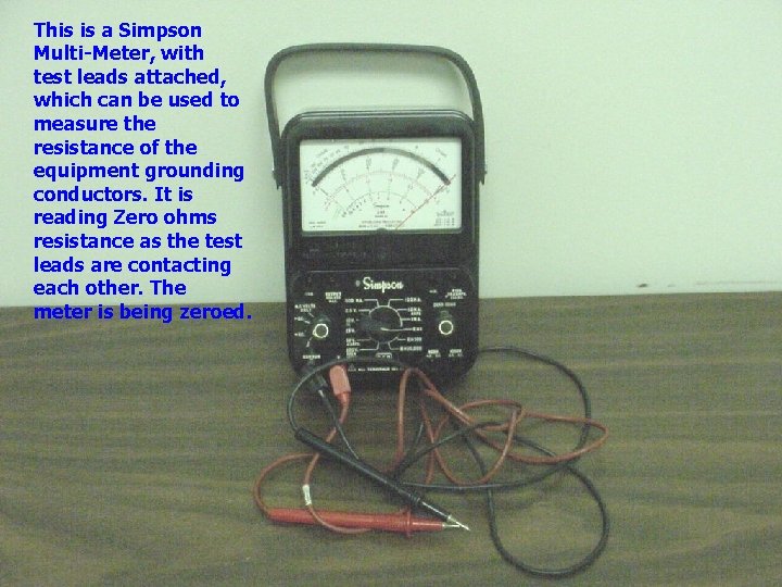 This is a Simpson Multi-Meter, with test leads attached, which can be used to
