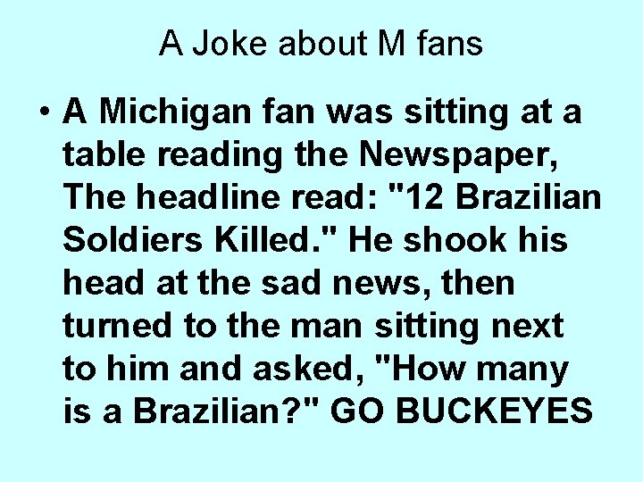 A Joke about M fans • A Michigan fan was sitting at a table