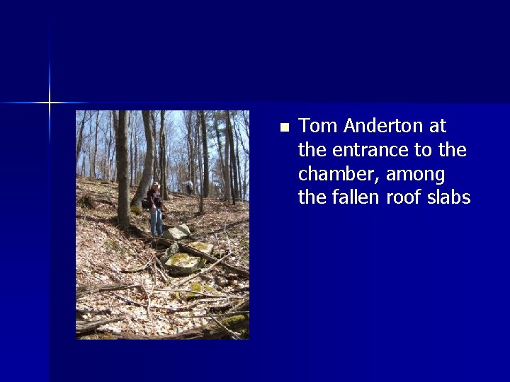 n Tom Anderton at the entrance to the chamber, among the fallen roof slabs