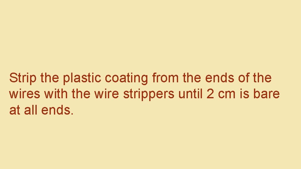 Strip the plastic coating from the ends of the wires with the wire strippers