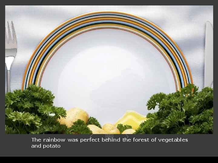 The rainbow was perfect behind the forest of vegetables and potato 