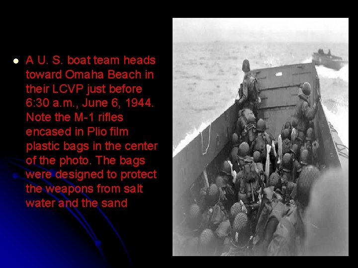 l A U. S. boat team heads toward Omaha Beach in their LCVP just