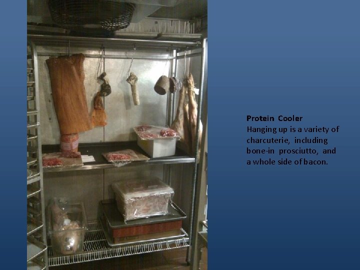Protein Cooler Hanging up is a variety of charcuterie, including bone-in prosciutto, and a