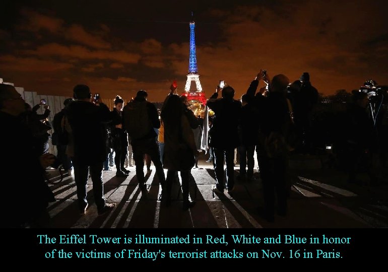 The Eiffel Tower is illuminated in Red, White and Blue in honor of the