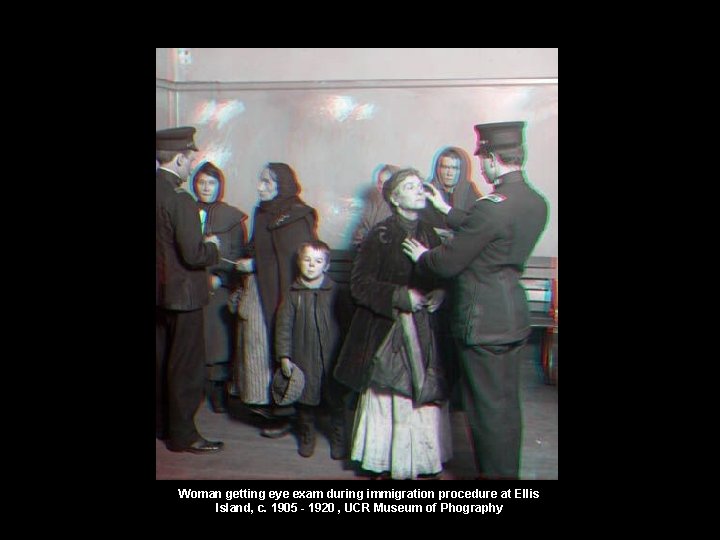 Woman getting eye exam during immigration procedure at Ellis Island, c. 1905 - 1920