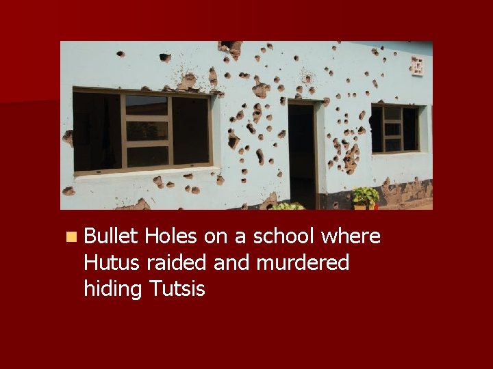 n Bullet Holes on a school where Hutus raided and murdered hiding Tutsis 