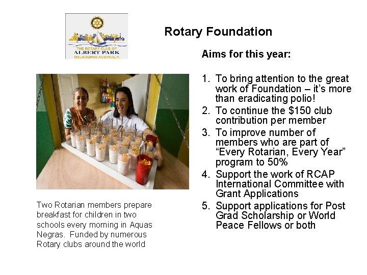 Rotary Foundation Aims for this year: Two Rotarian members prepare breakfast for children in