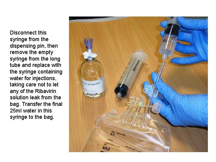 Disconnect this syringe from the dispensing pin, then remove the empty syringe from the