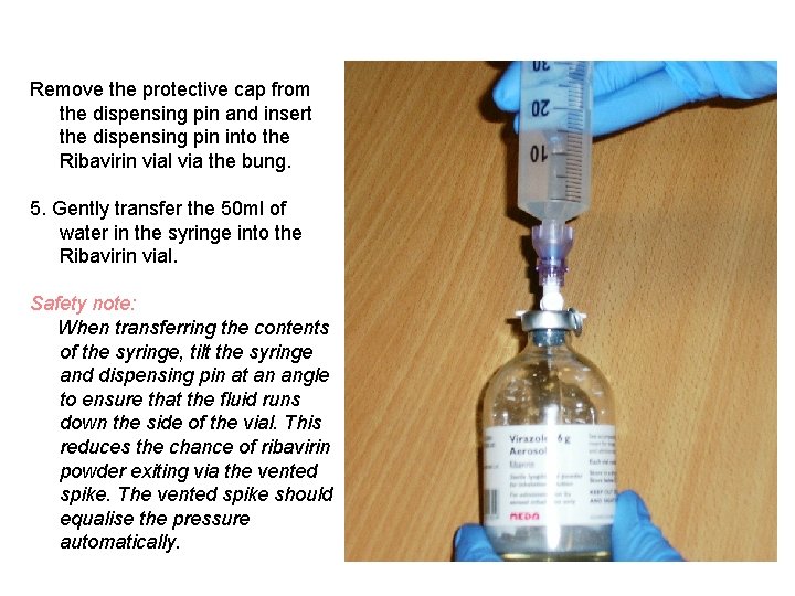 Remove the protective cap from the dispensing pin and insert the dispensing pin into