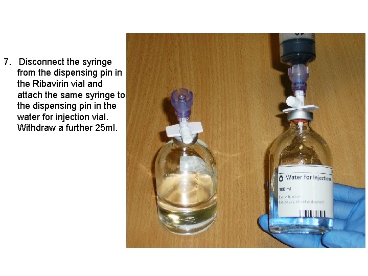 7. Disconnect the syringe from the dispensing pin in the Ribavirin vial and attach