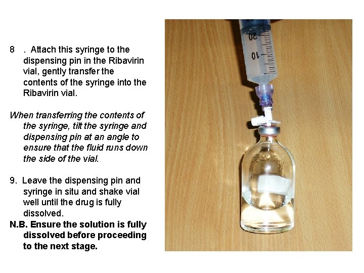 8. Attach this syringe to the dispensing pin in the Ribavirin vial, gently transfer